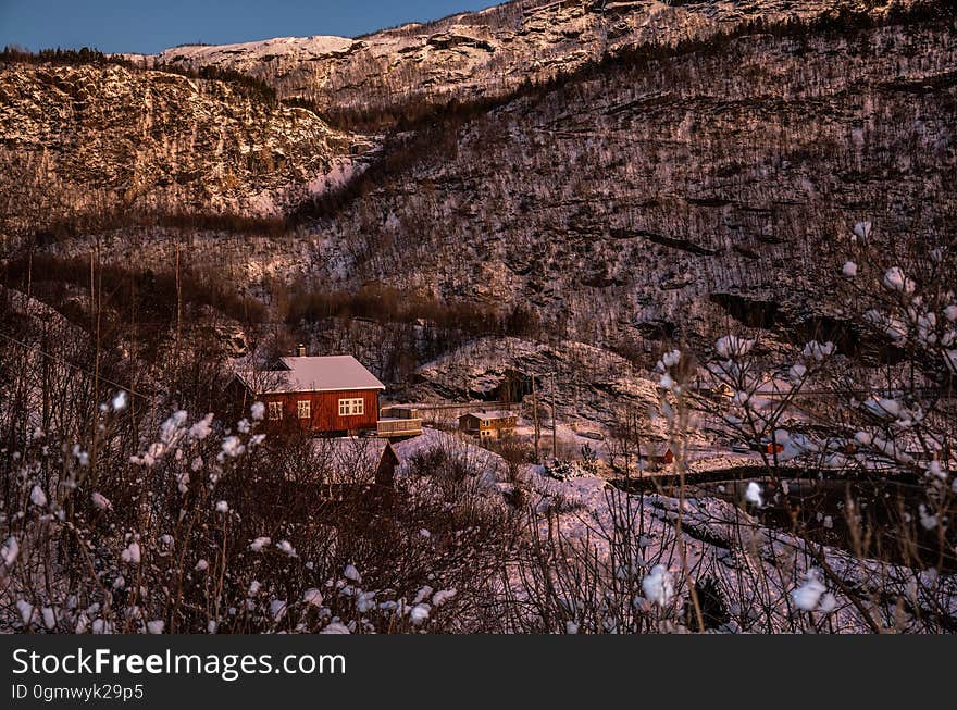 House on Mountain Against Sky