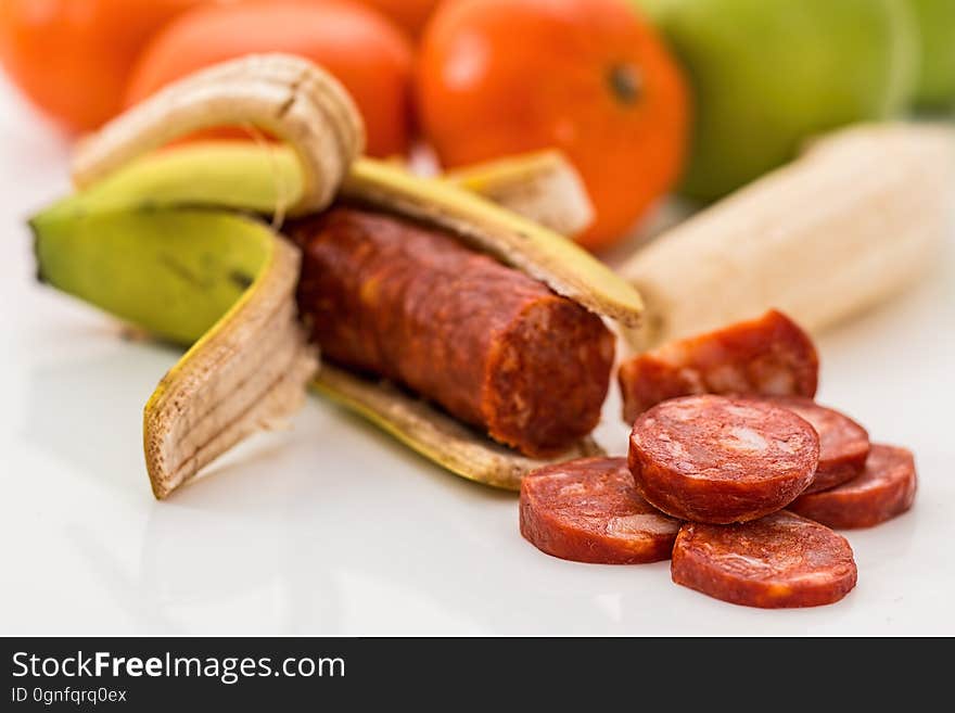 Closeup of chorizo in a banana peel. Closeup of chorizo in a banana peel.