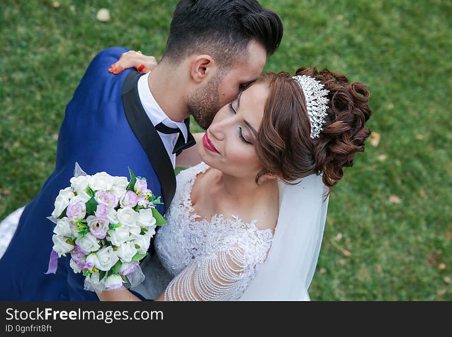 Happy Couple Holding Flower