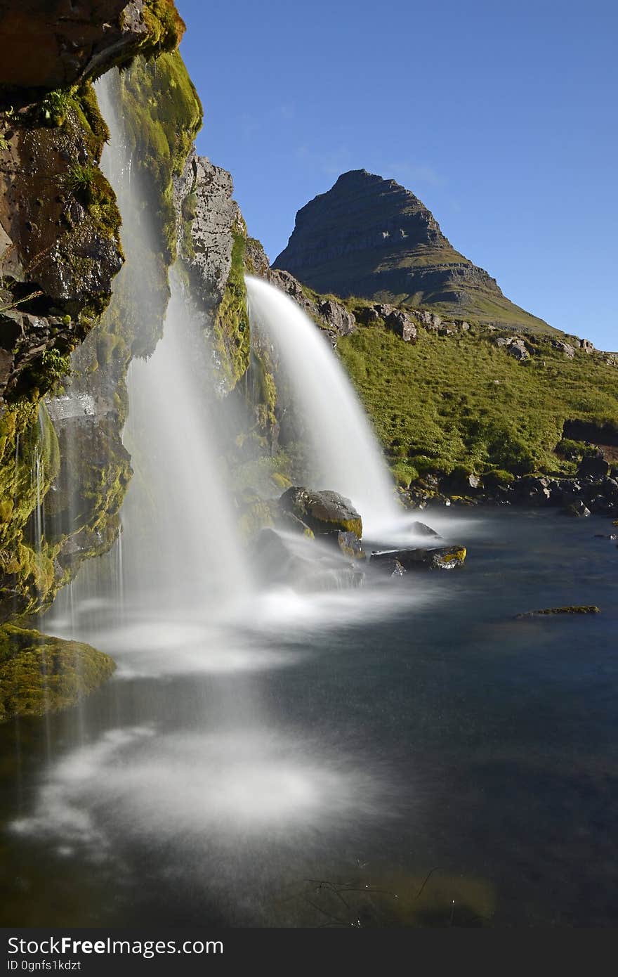 Waterfalls Near Green Grass during Daytime