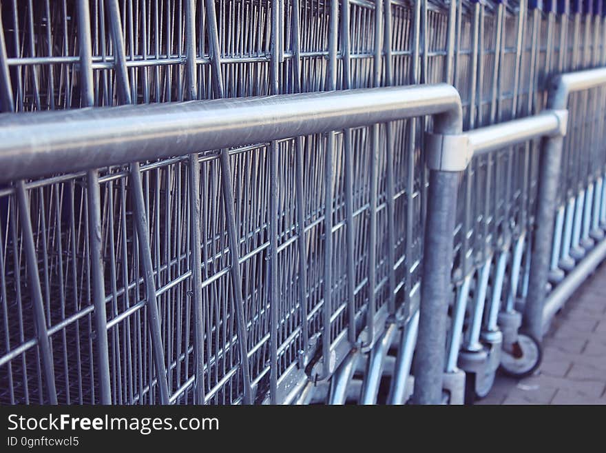 Closeup of shopping carts stacked together.