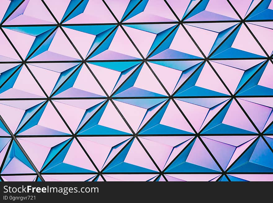 Abstract geometric 3D cube patterns in pink and blue. Abstract geometric 3D cube patterns in pink and blue.