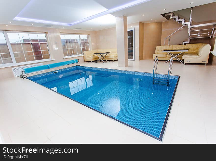 A swimming pool in an elegant luxury home. A swimming pool in an elegant luxury home.