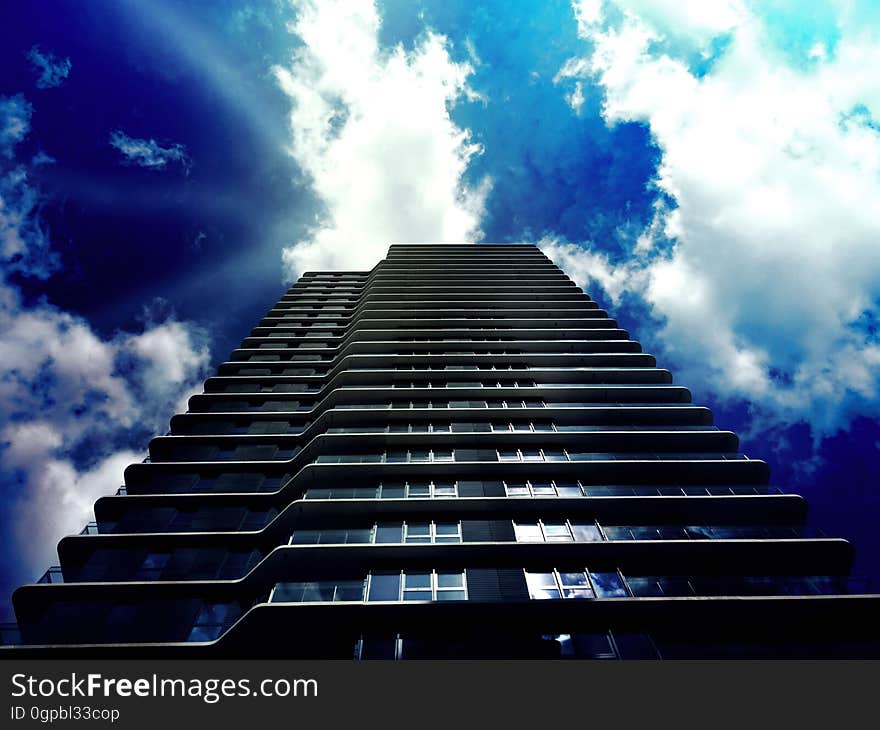 A modern high rise building from a low angle.