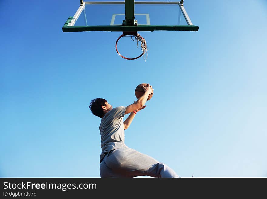 Man Dunking the Ball