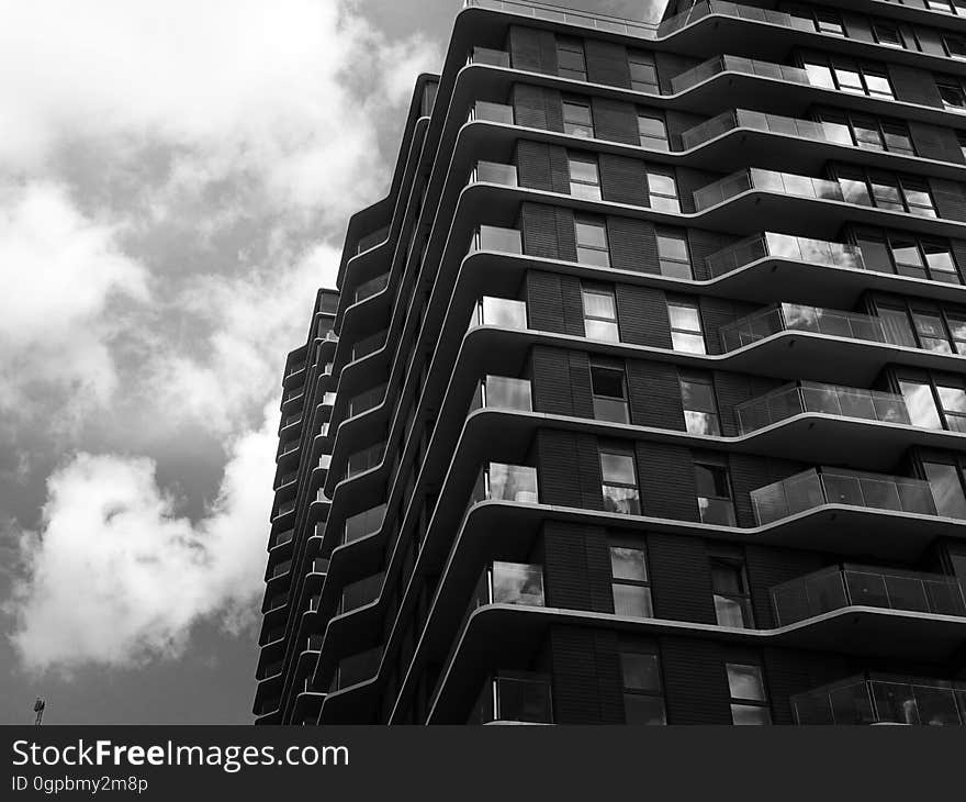 The exterior of a tall modern building. The exterior of a tall modern building.