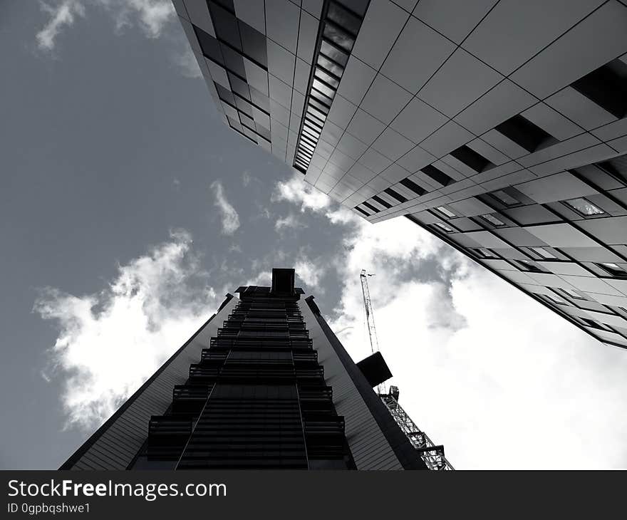 A view from the ground of towering buildings.