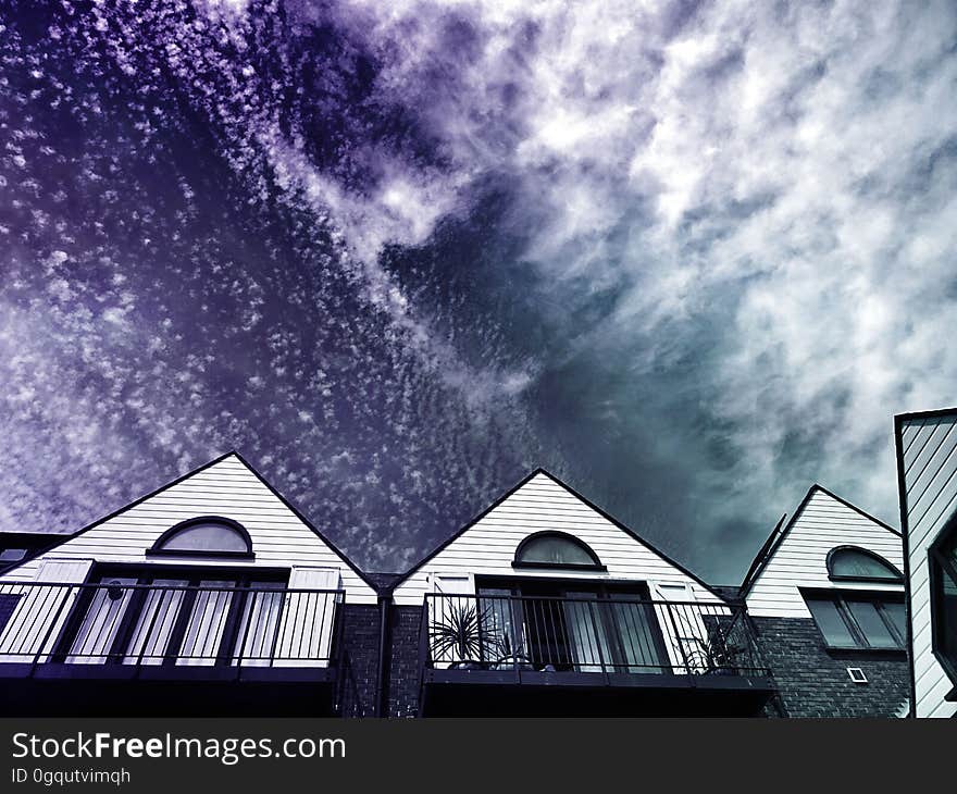 Housetops with the night sky in the background. Housetops with the night sky in the background.