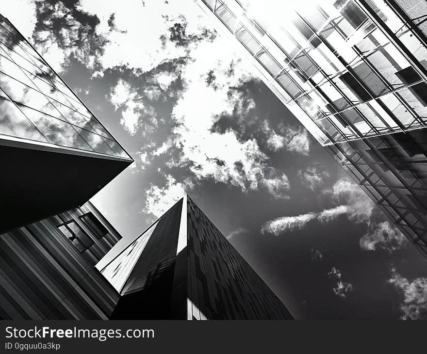 A view of the sky between building tops.