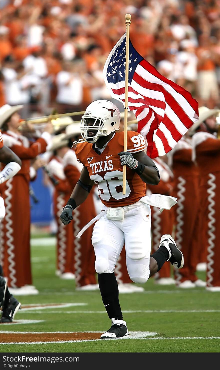 Nfl Player Holding U.s.a. Flag on Field