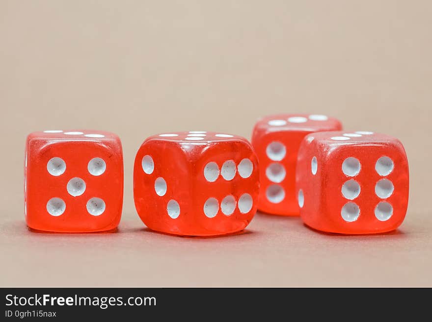 Close Up Photography of 4 Red White Dice