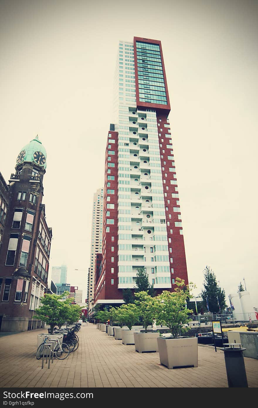 The Montevideo tower and the New York hotel in Kop van Zuid at port of Rotterdam, Netherlands. The Montevideo tower and the New York hotel in Kop van Zuid at port of Rotterdam, Netherlands.