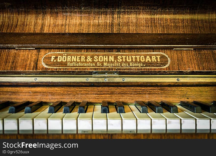 An antique piano close up.