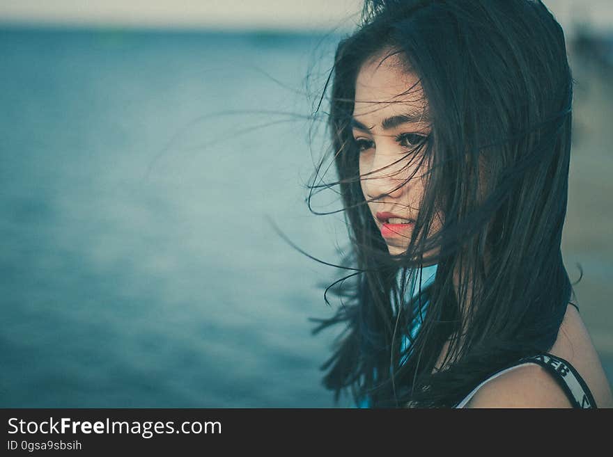 A close up portrait of an Asian woman.