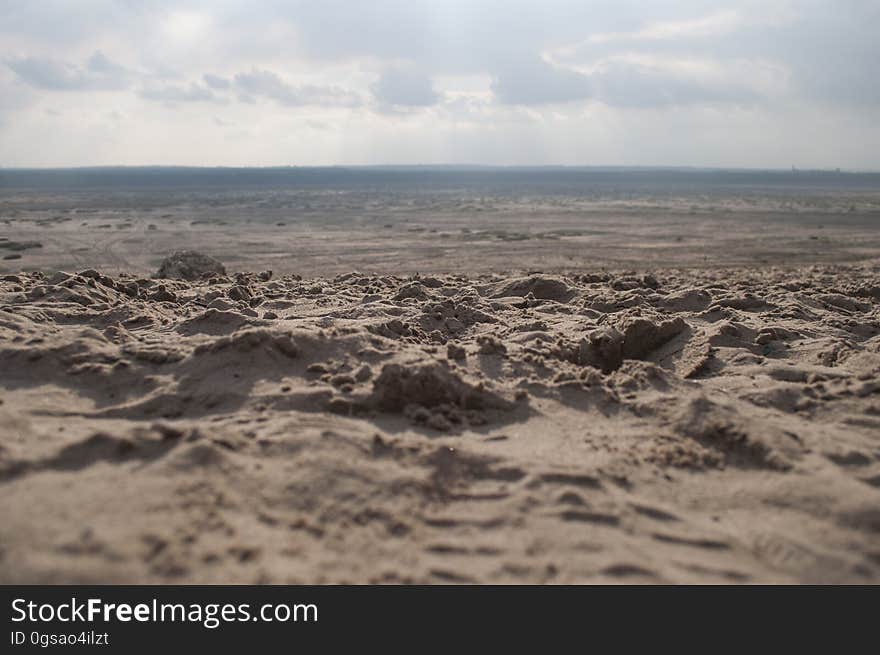 A desert landscape with sand dunes.