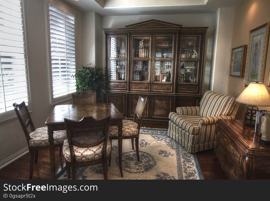 A living room with antique furniture.