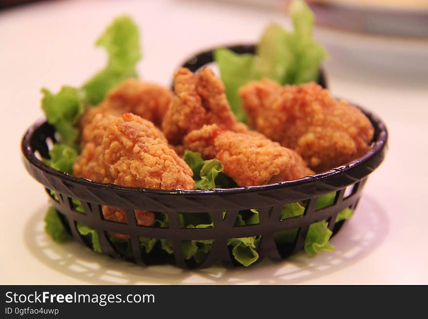 Cooked Leg Chicken With Green Vegetable Leaf