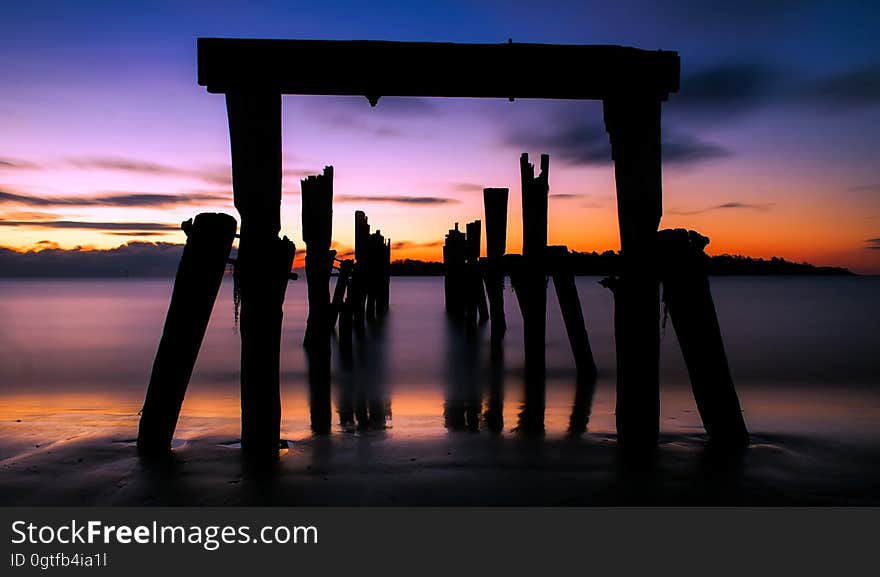 Scenic View of Beach Against Sky during Sunset