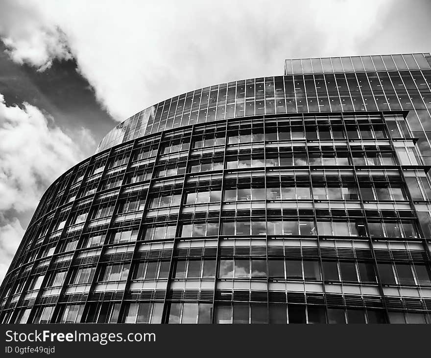 A modern building with a curved exterior. A modern building with a curved exterior.