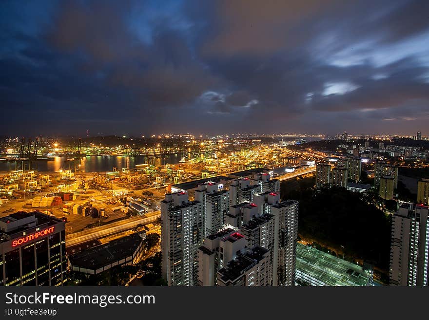 Aerial view of city illuminated at night. Aerial view of city illuminated at night.