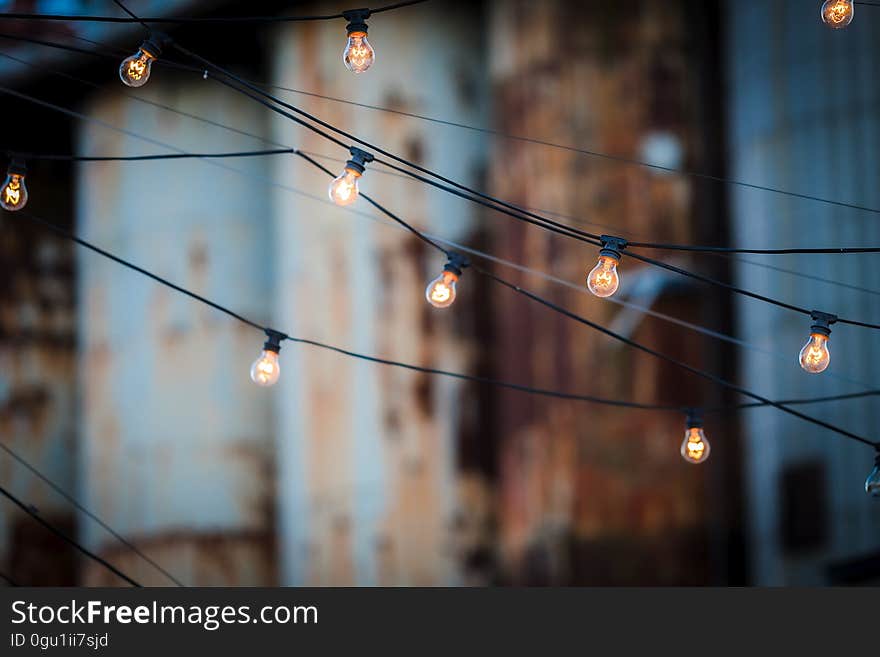 Close-up of Illuminated Lighting Equipment Against the Sky