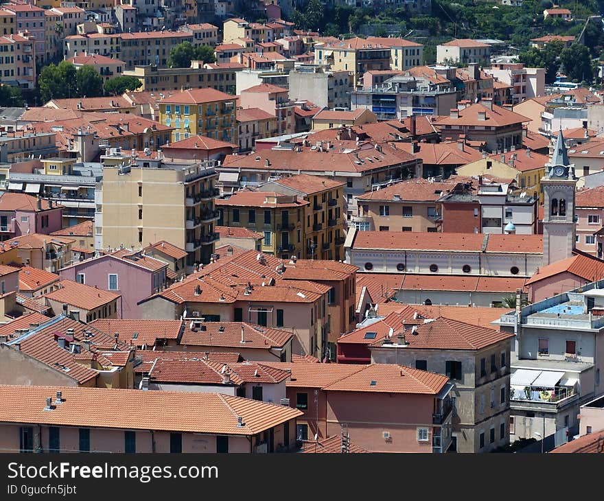 A view of the roofs in a city. A view of the roofs in a city.