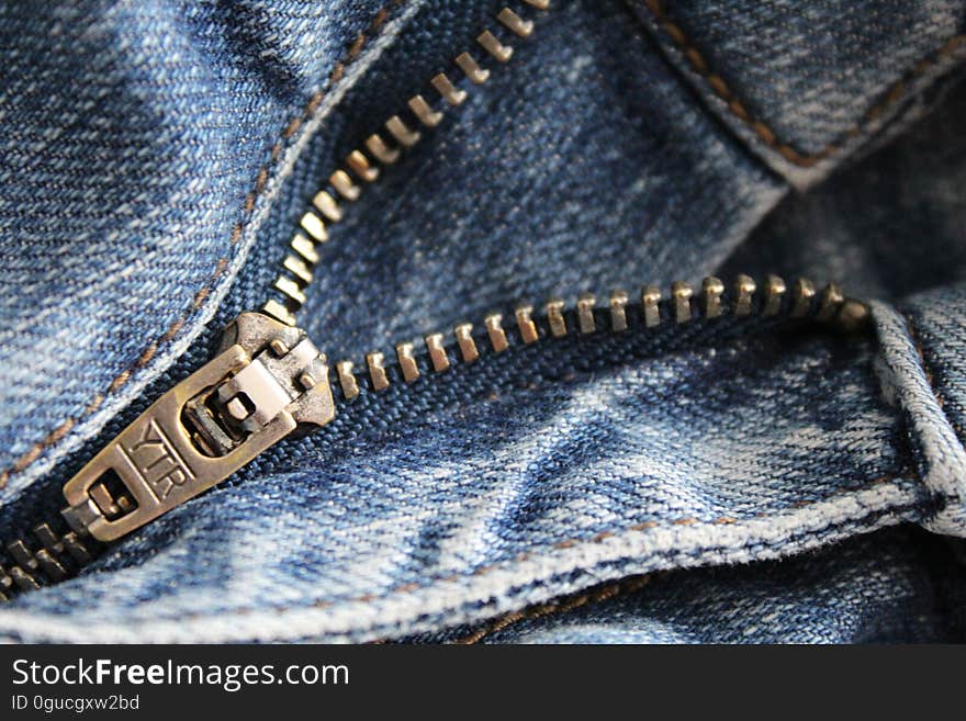 Close Up of Zipper of Blue Denim Bottoms