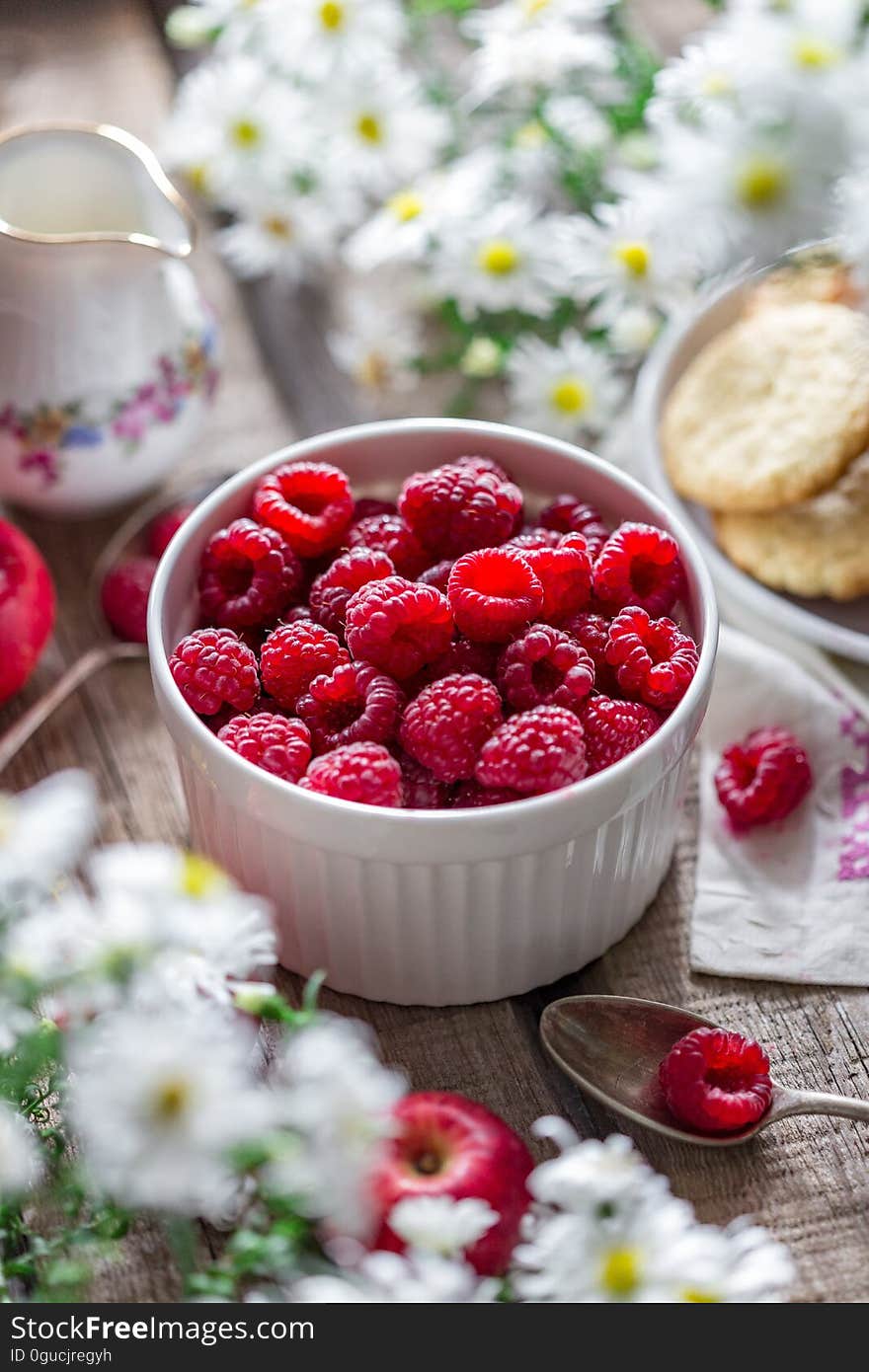 Close-up of Raspberries in Bowl on Table