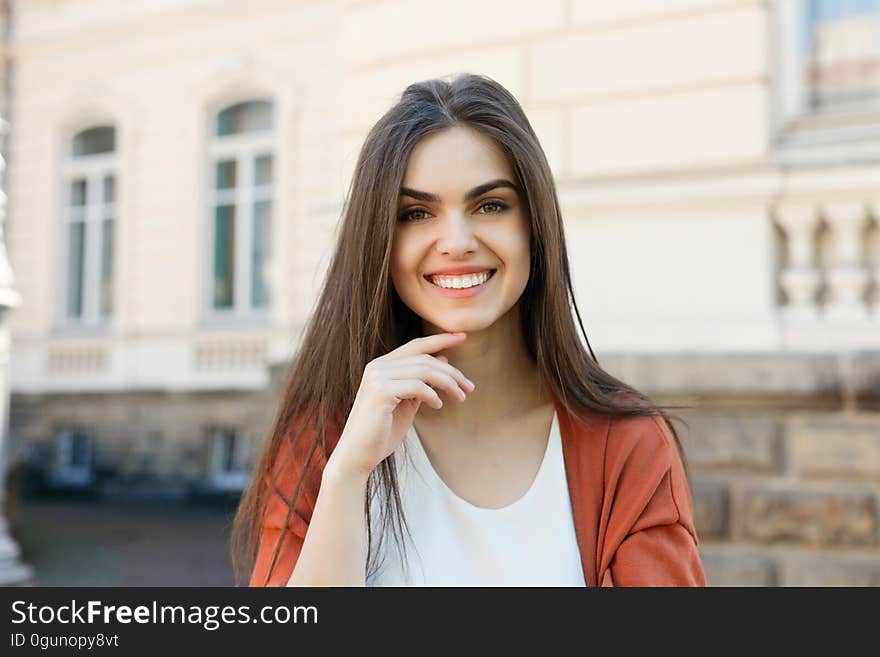 Young beautiful stylish woman walking