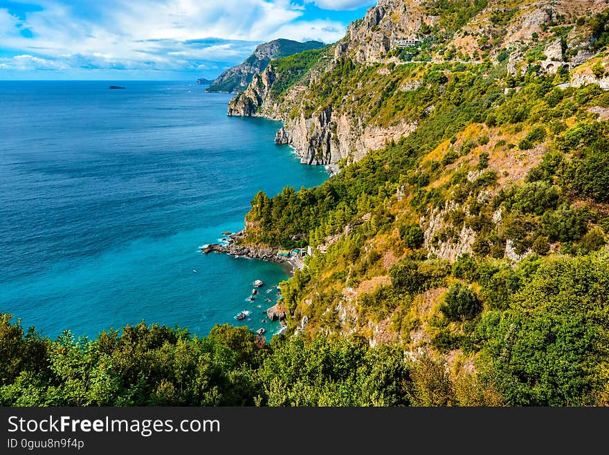 A view of a rocky coast and the sea.