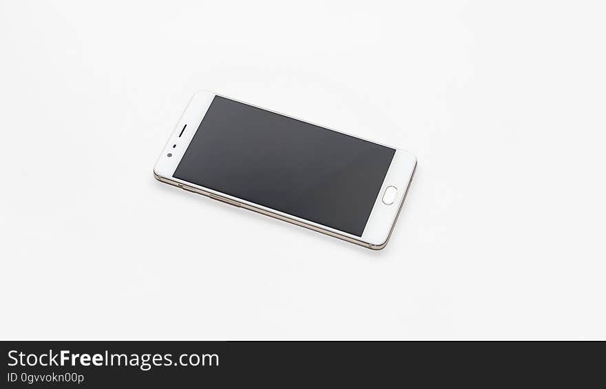 An android phone isolated on white. An android phone isolated on white.