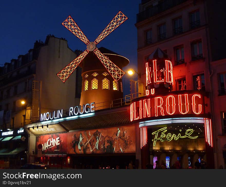 Moulin Rouge Neon Light Sign on Concrete Building