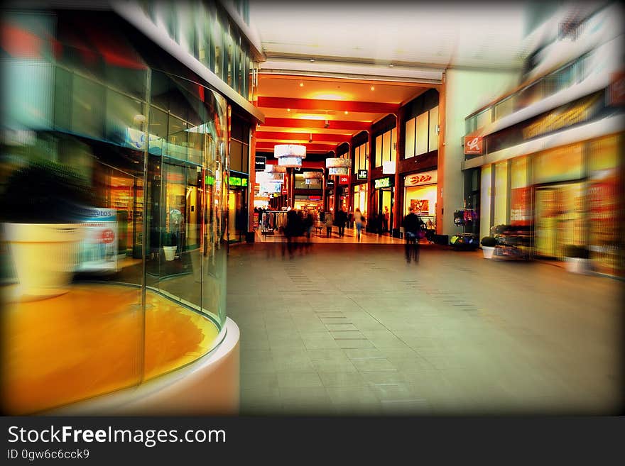 Interior of shopping center with blur of motion.