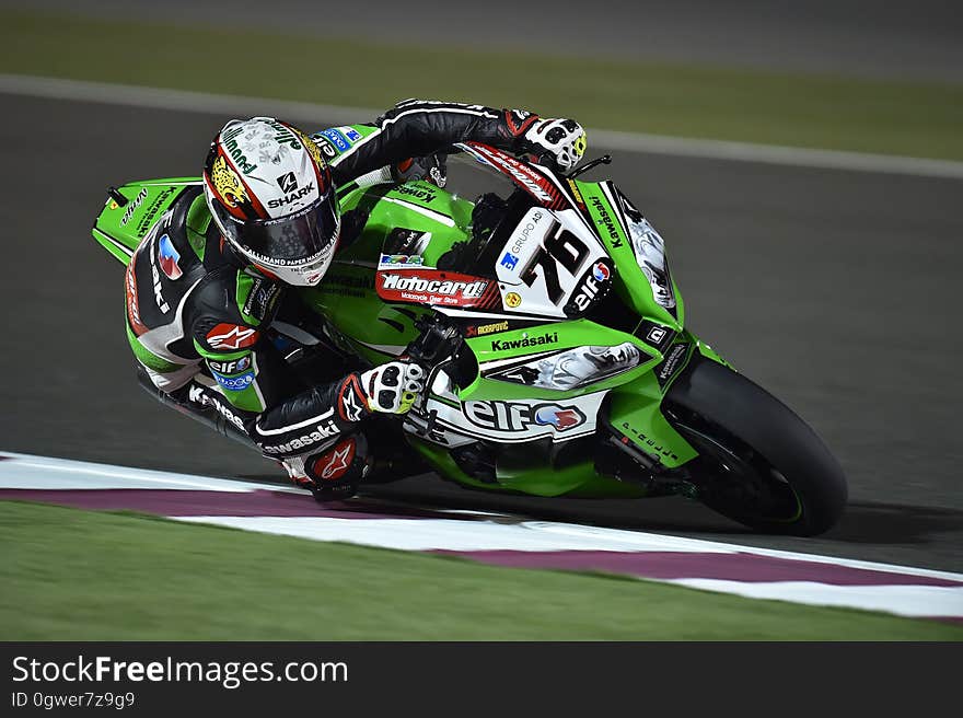 Green and Black #76 Kawasaki Motogp Rider