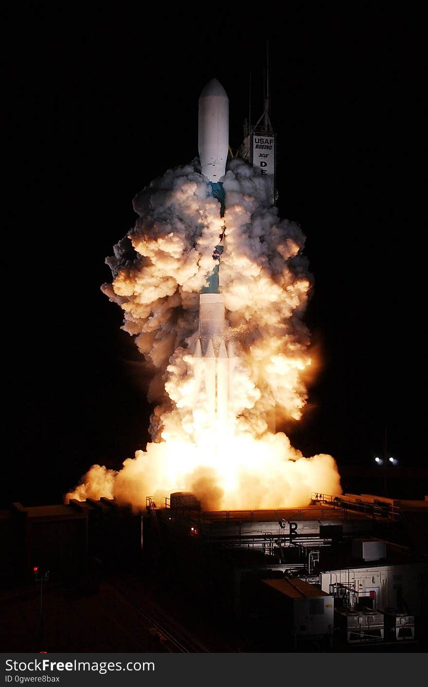 Night launch of NASA space shuttle from pad. Night launch of NASA space shuttle from pad.