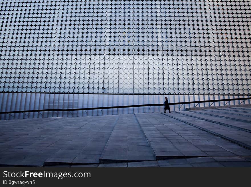 Man Standing on Modern Office Building