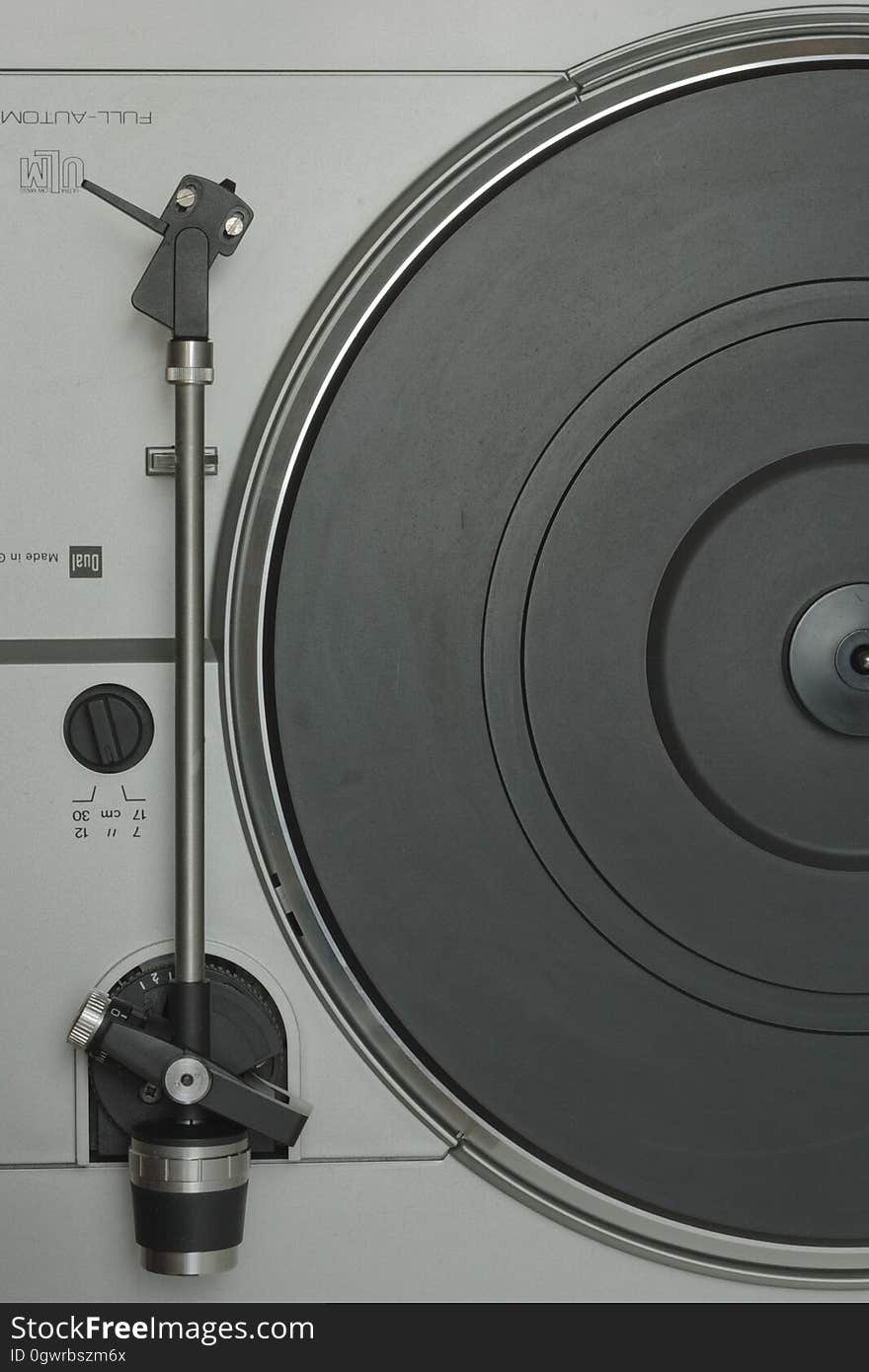 Grey and Black Turntable in a Close Up Photography