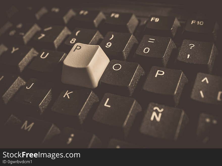 A close up of the keys on a computer keyboard. A close up of the keys on a computer keyboard.