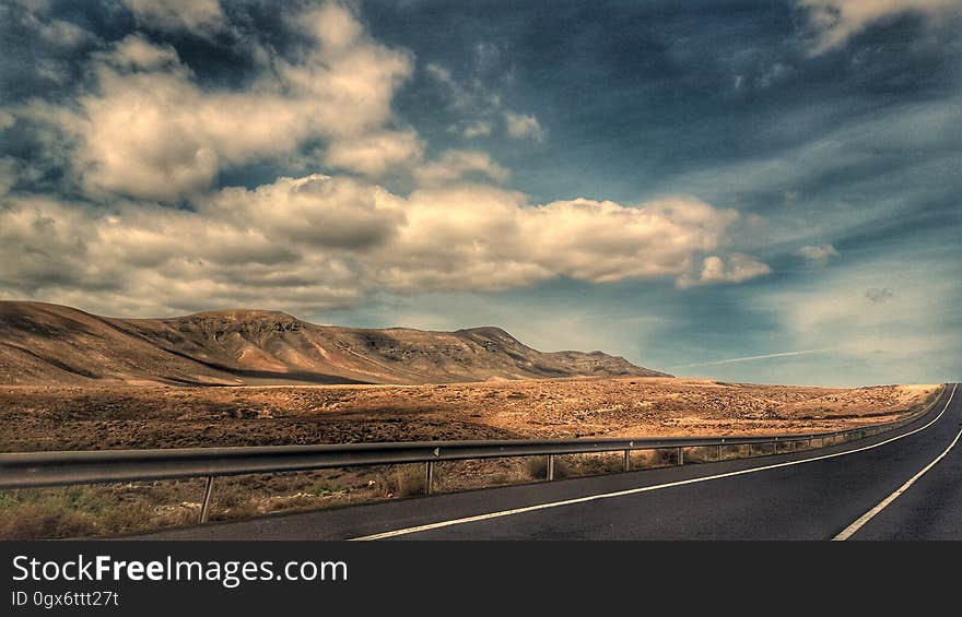 A highway through a desert. A highway through a desert.