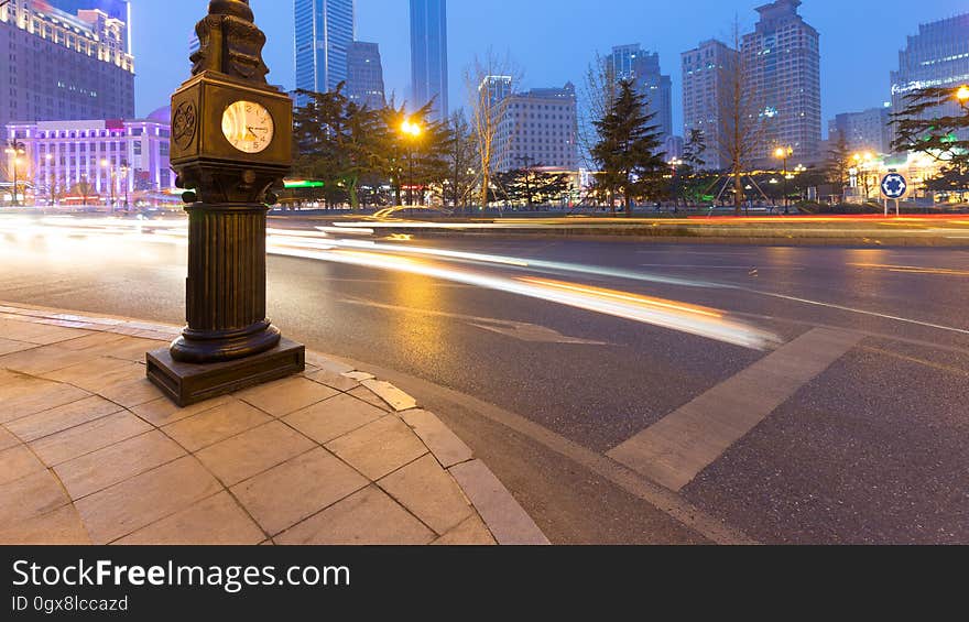 China Dalian, evening city building and traffic, car track. China Dalian, evening city building and traffic, car track