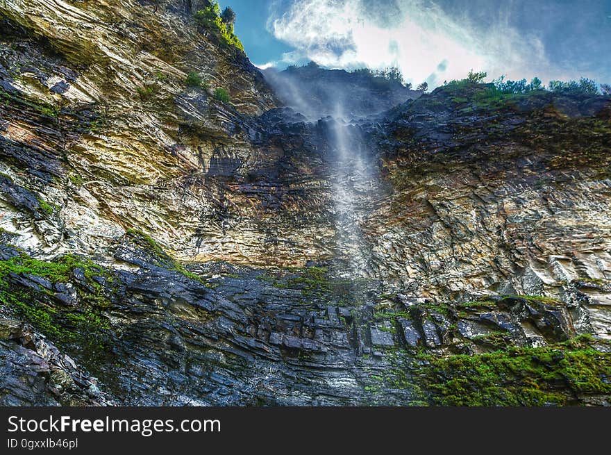 A view of steep rocks in the mountains. A view of steep rocks in the mountains.