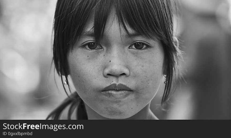 A monochrome portrait of a young girl. A monochrome portrait of a young girl.