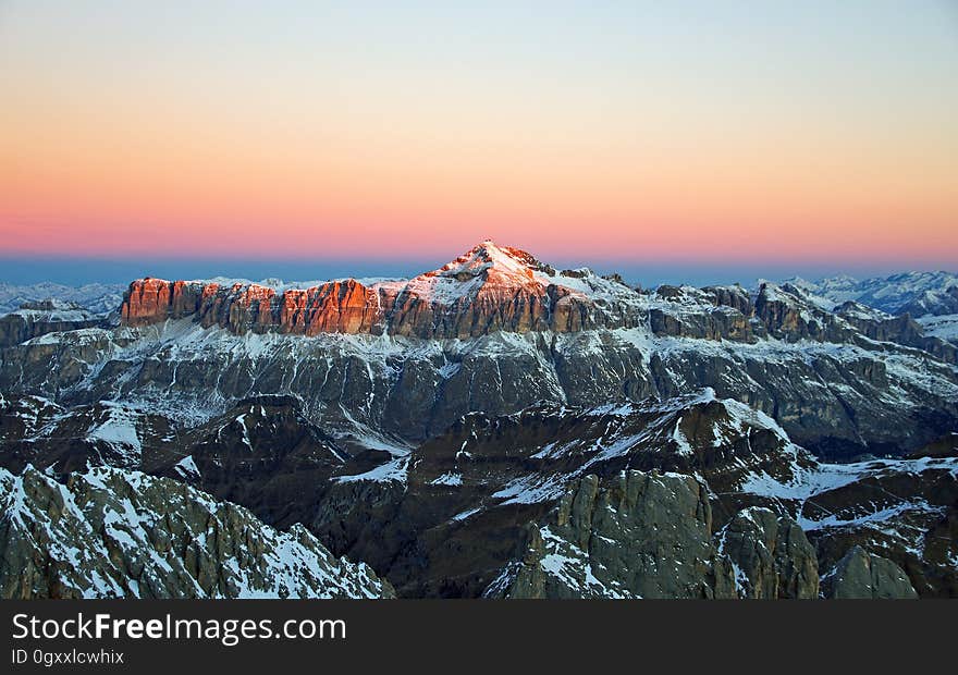 View of Snow Covered Mountain during Sunset