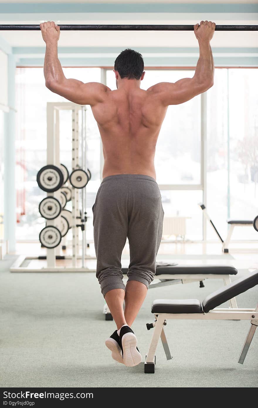 Man Doing Pull Ups Best Back Exercises