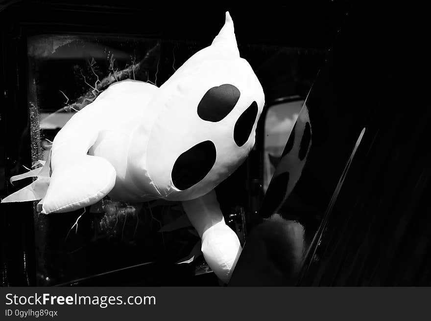 Cloth ghost toy in black and white.