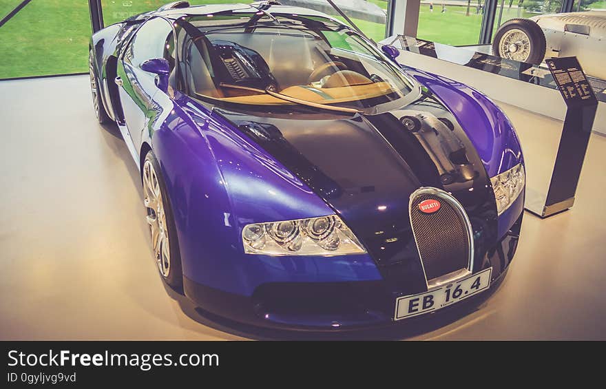 Closeup of classic sports car in showroom.