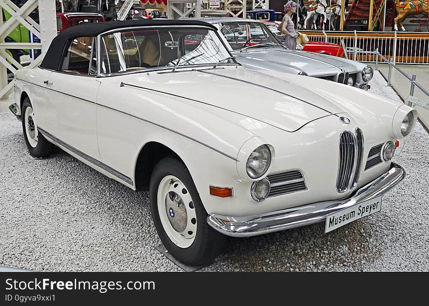 White Classic Car Beside White Silver Classic Car