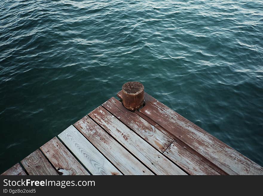 Dark Green Sea Water Wooden Pier