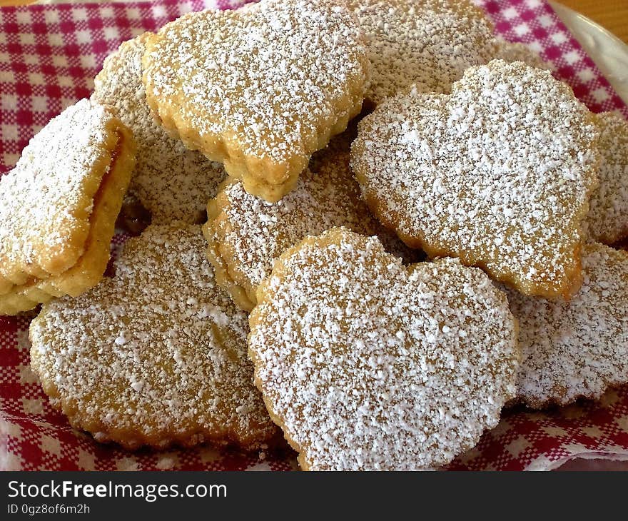 A pile of layered cookies with heart shape. A pile of layered cookies with heart shape.