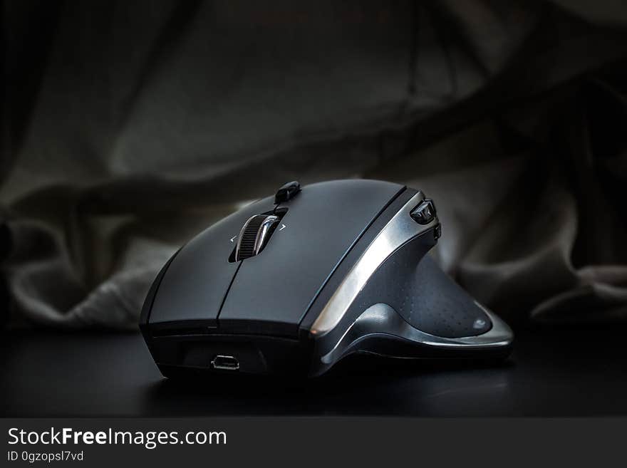 A close up of an anatomically shaped computer mouse. A close up of an anatomically shaped computer mouse.